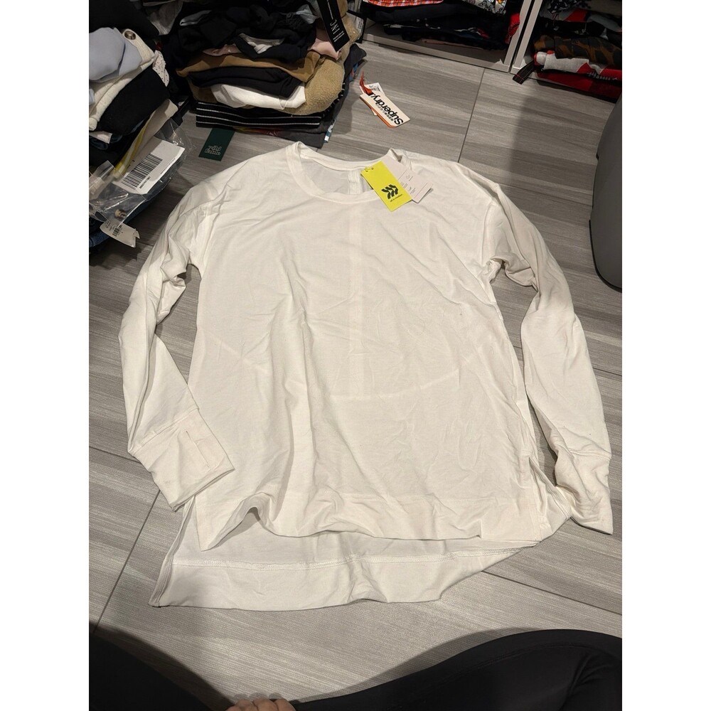 Brand new all in motion top